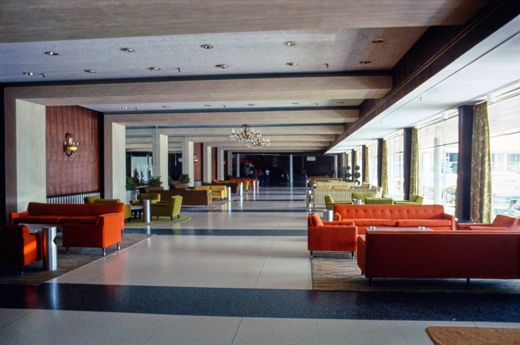 The Wexley lobby with its long gallery, tan sofas and tall windows