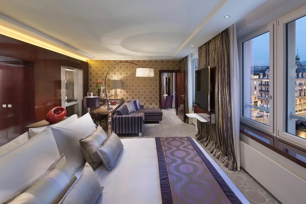 Wexley Suite living area with sofa and view across the rooftops